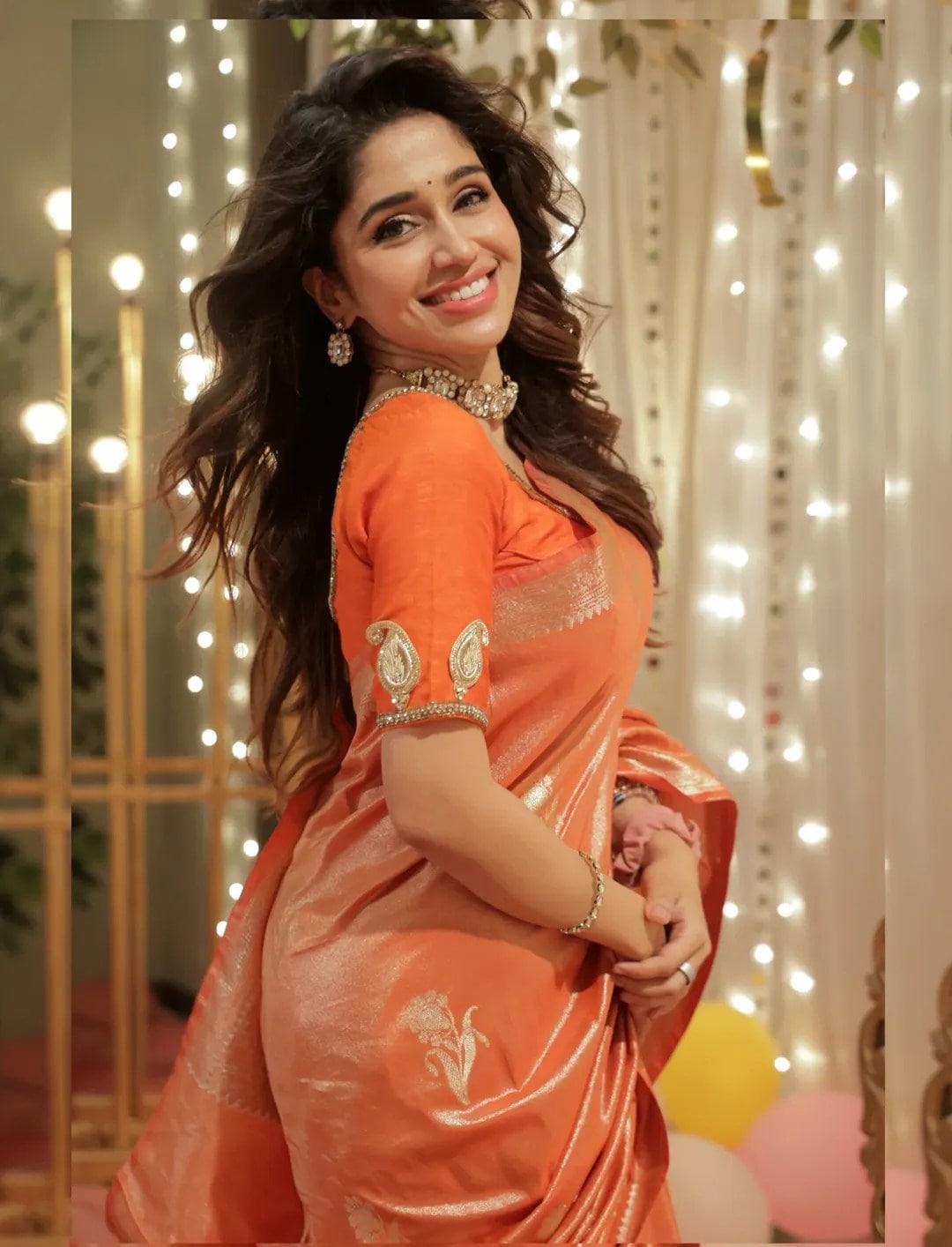 Purniemaa Dey Orange Saree Look