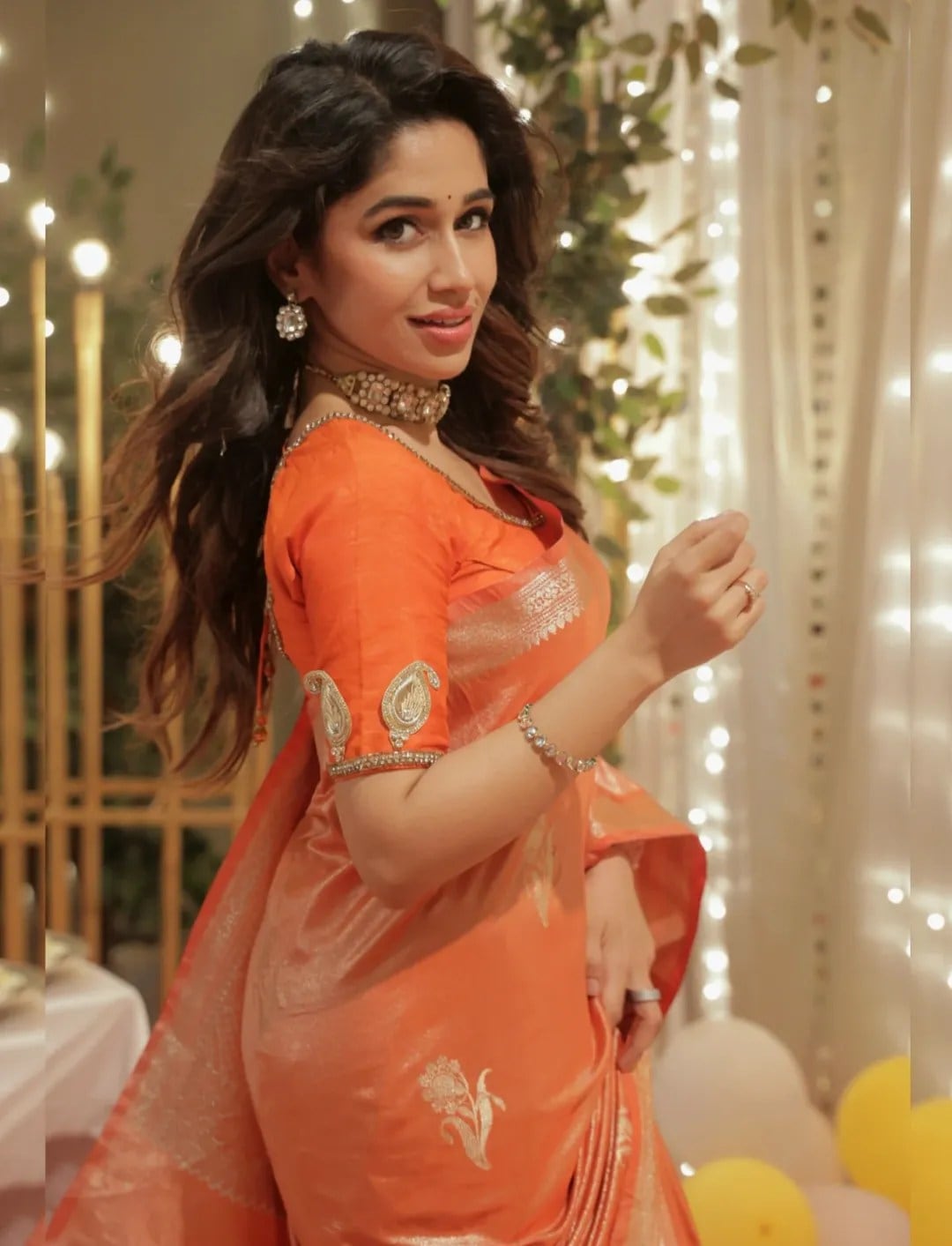 Purniemaa Dey Orange Saree Look