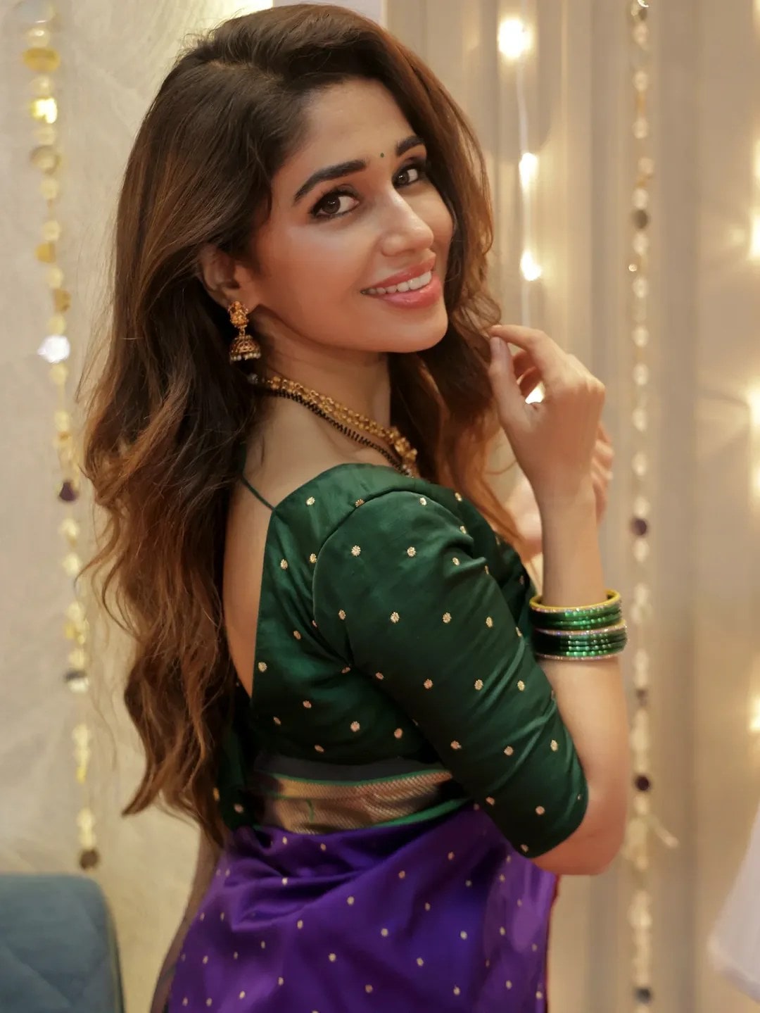 Purniemaa Dey Orange Saree Look