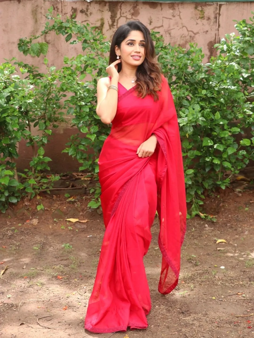 Purniemaa Dey Orange Saree Look