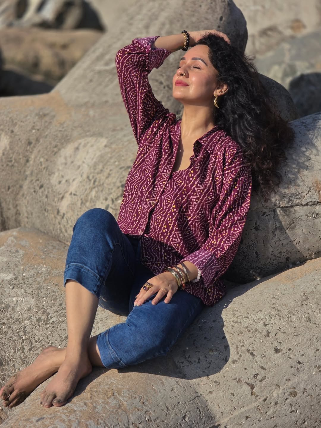 Sukhada Khandkekar beach photoshoot bandhani print shirt look