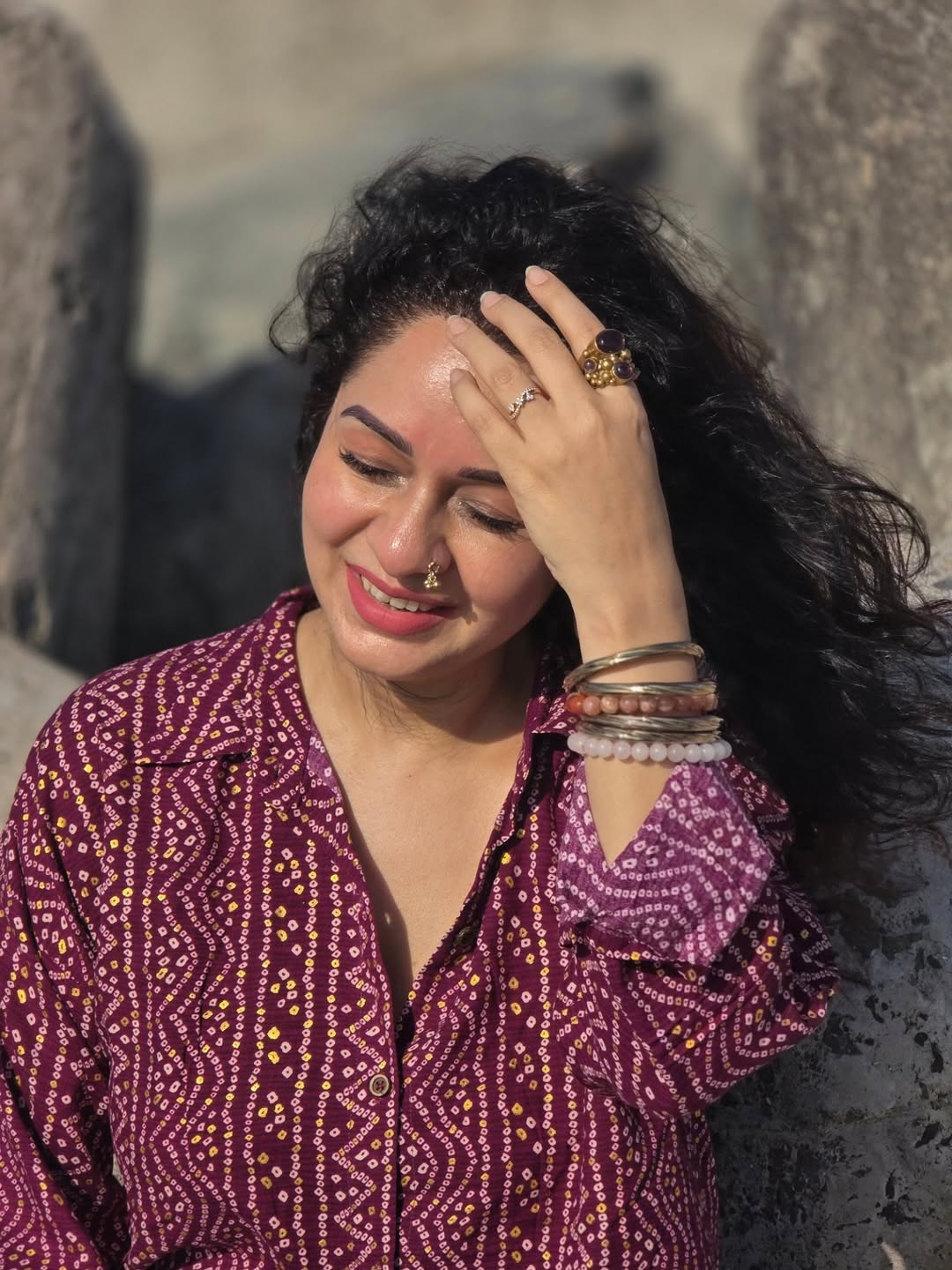 Sukhada Khandkekar beach photoshoot bandhani print shirt look