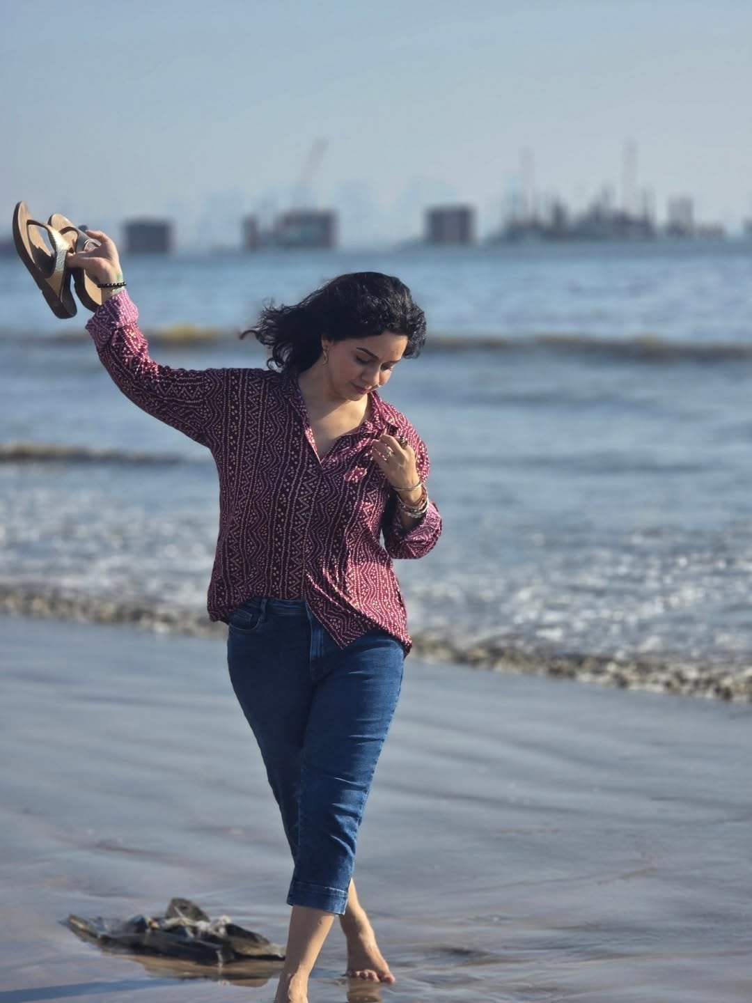 Sukhada Khandkekar beach photoshoot bandhani print shirt look