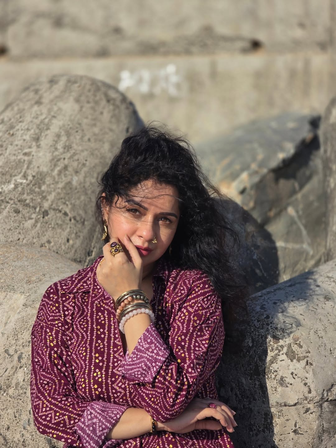 Sukhada Khandkekar beach photoshoot bandhani print shirt look