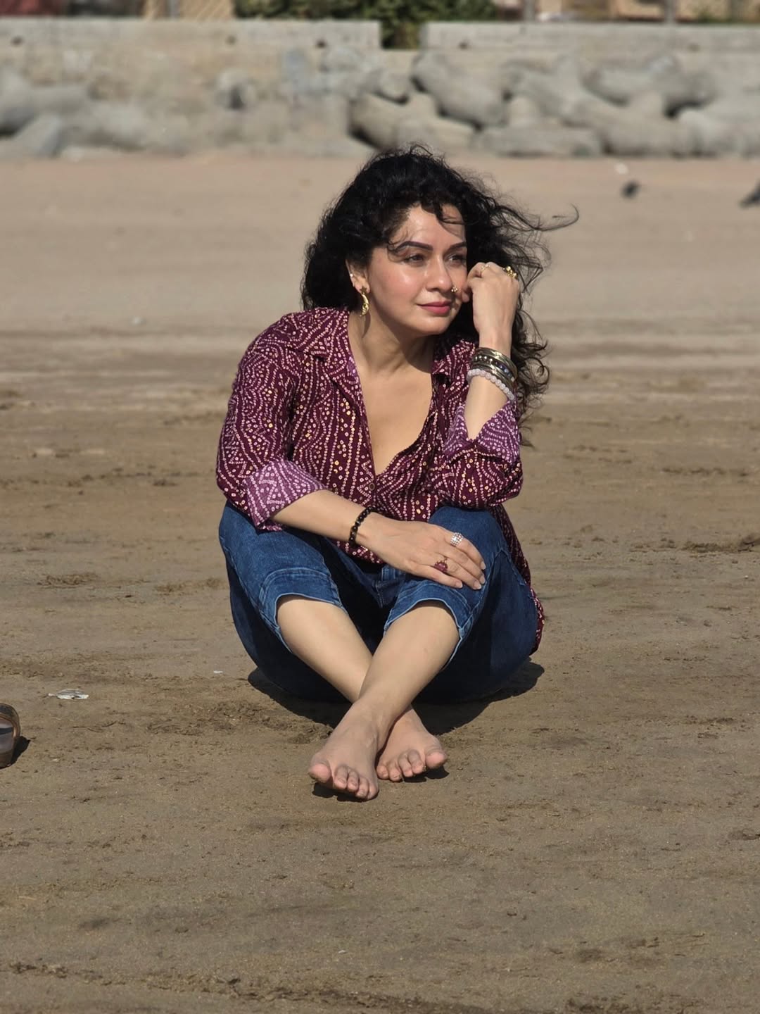 Sukhada Khandkekar beach photoshoot bandhani print shirt look