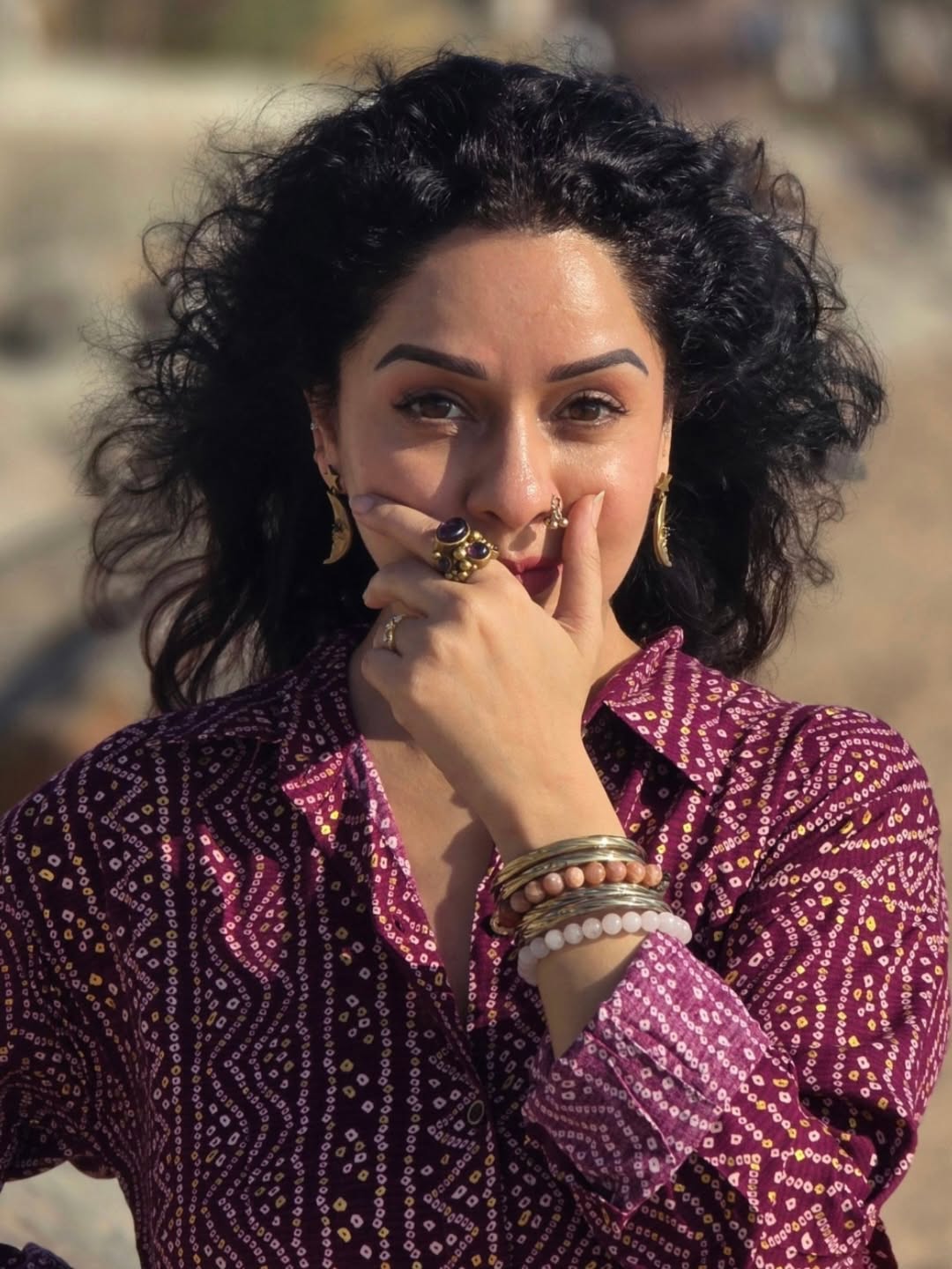 Sukhada Khandkekar beach photoshoot bandhani print shirt look