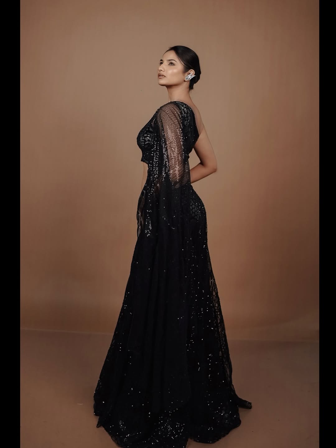 Pooja Birari black gown look