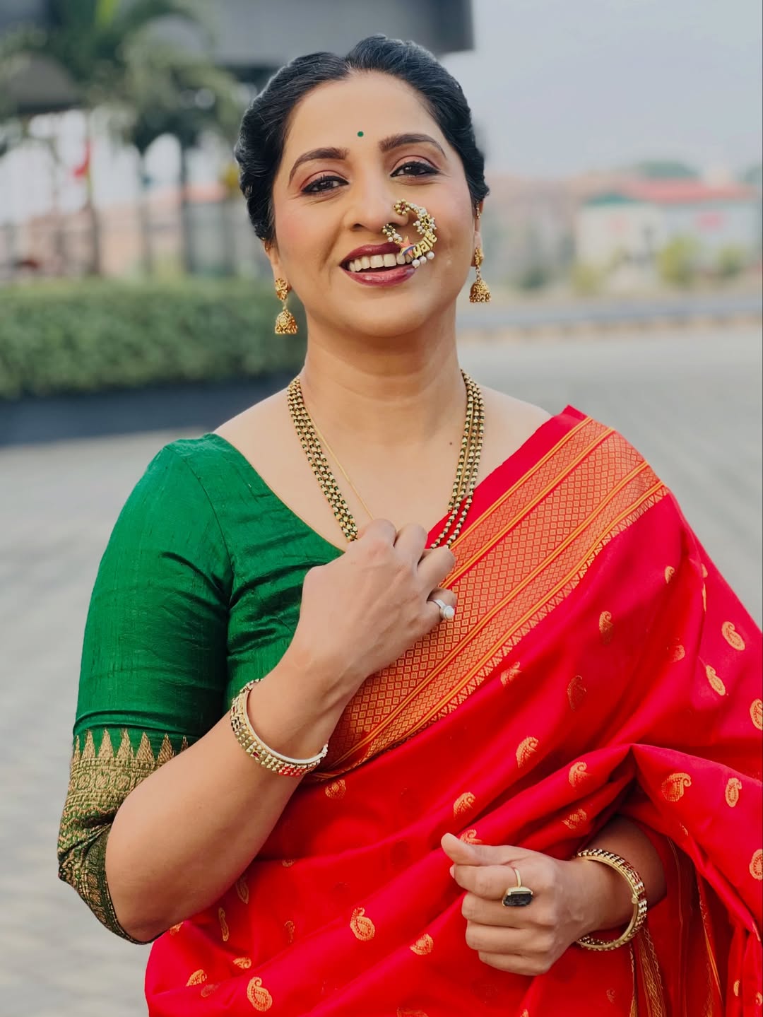 Madhurani Gokhale Orange Saree Look