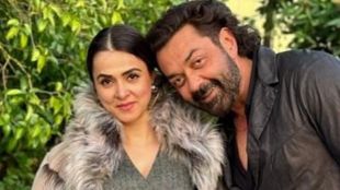 Actor Bobby Deol and wife Tania Deol photo with office building representational image.