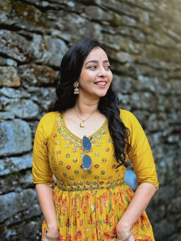 Rupal Nand purple saree look