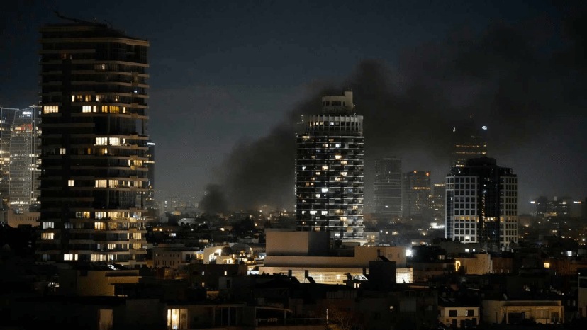 Smoke rises after an Iranian missile attack, in Tel Aviv, Israel, Saturday, Feb. 28, 2026. (AP Photo)
