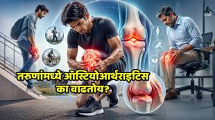 Young person holding pained knee, Osteoarthritis awareness
