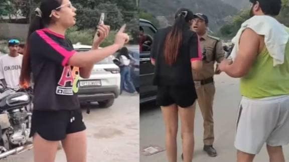 The argument escalated until the woman's husband intervened and led her away from the scene