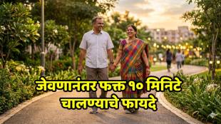 A person walking outdoors after a meal for blood sugar management.