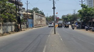 Palghar District Headquarters road construction | PWD Maharashtra road widening hurdles | Bitumen shortage impact on infra projects | Chhatrapati Shivaji Maharaj Chowk Palghar road status