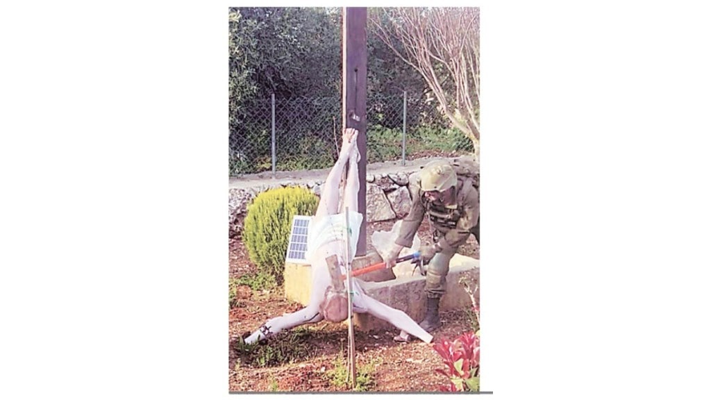 Israel soldier desecrating Jesus Christ statue Lebanon | IDF soldier hammer statue video viral | Benjamin Netanyahu condemns statue desecration | Israel Lebanon conflict religious site damage Israel soldier desecrating Jesus Christ statue Lebanon | IDF soldier hammer statue video viral | Benjamin Netanyahu condemns statue desecration | Israel Lebanon conflict religious site damage