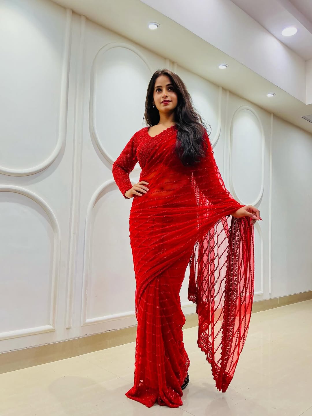 Prapti Redkar in red designer saree