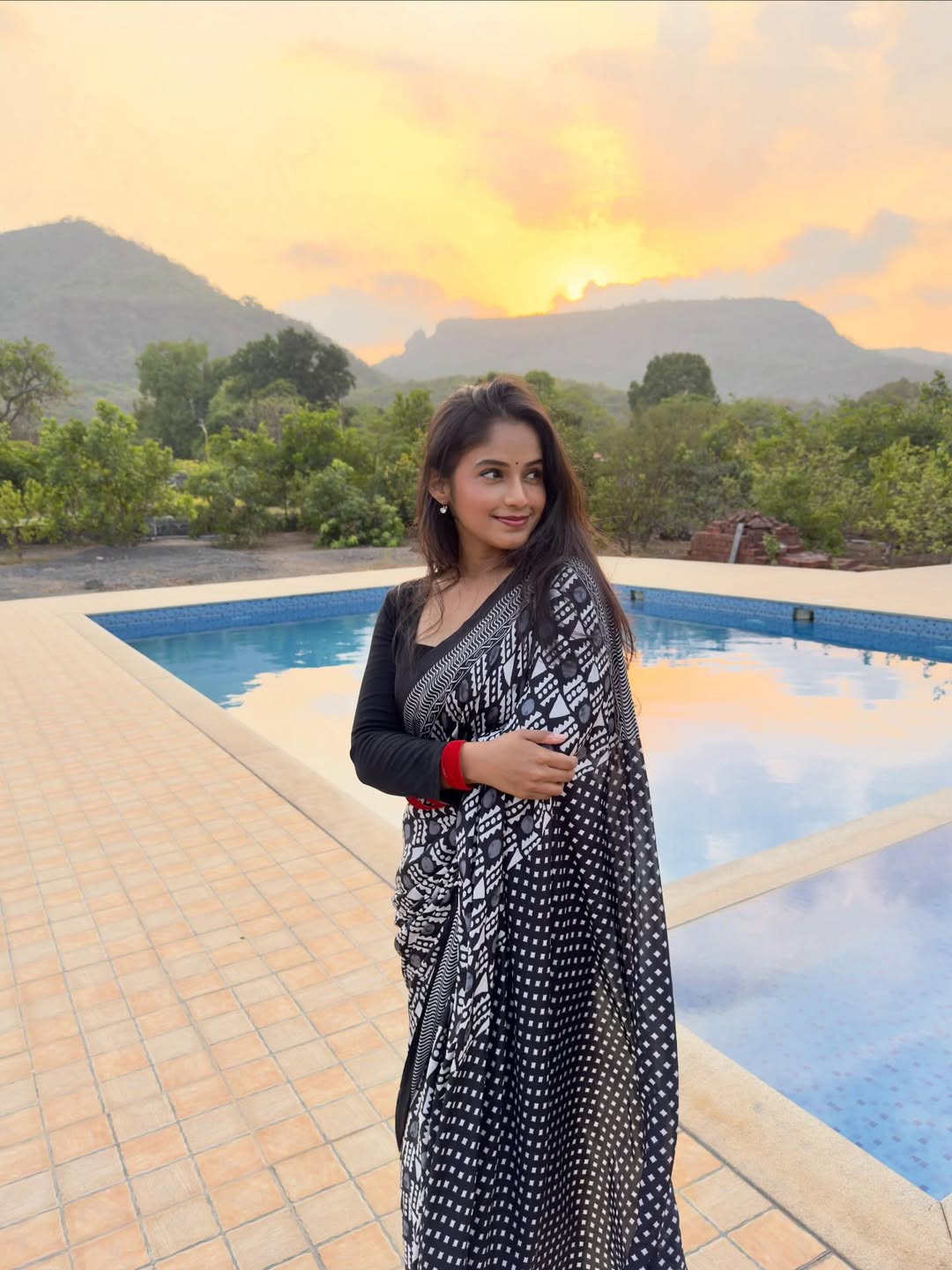 Prapti Redkar in red designer saree