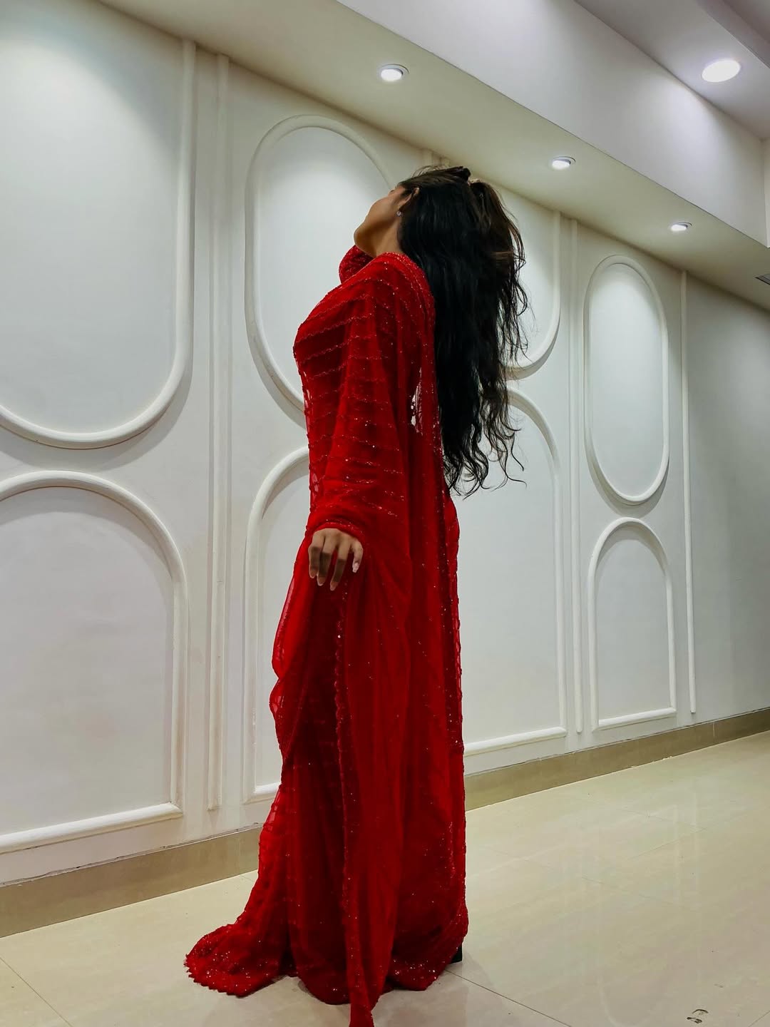 Prapti Redkar in red designer saree