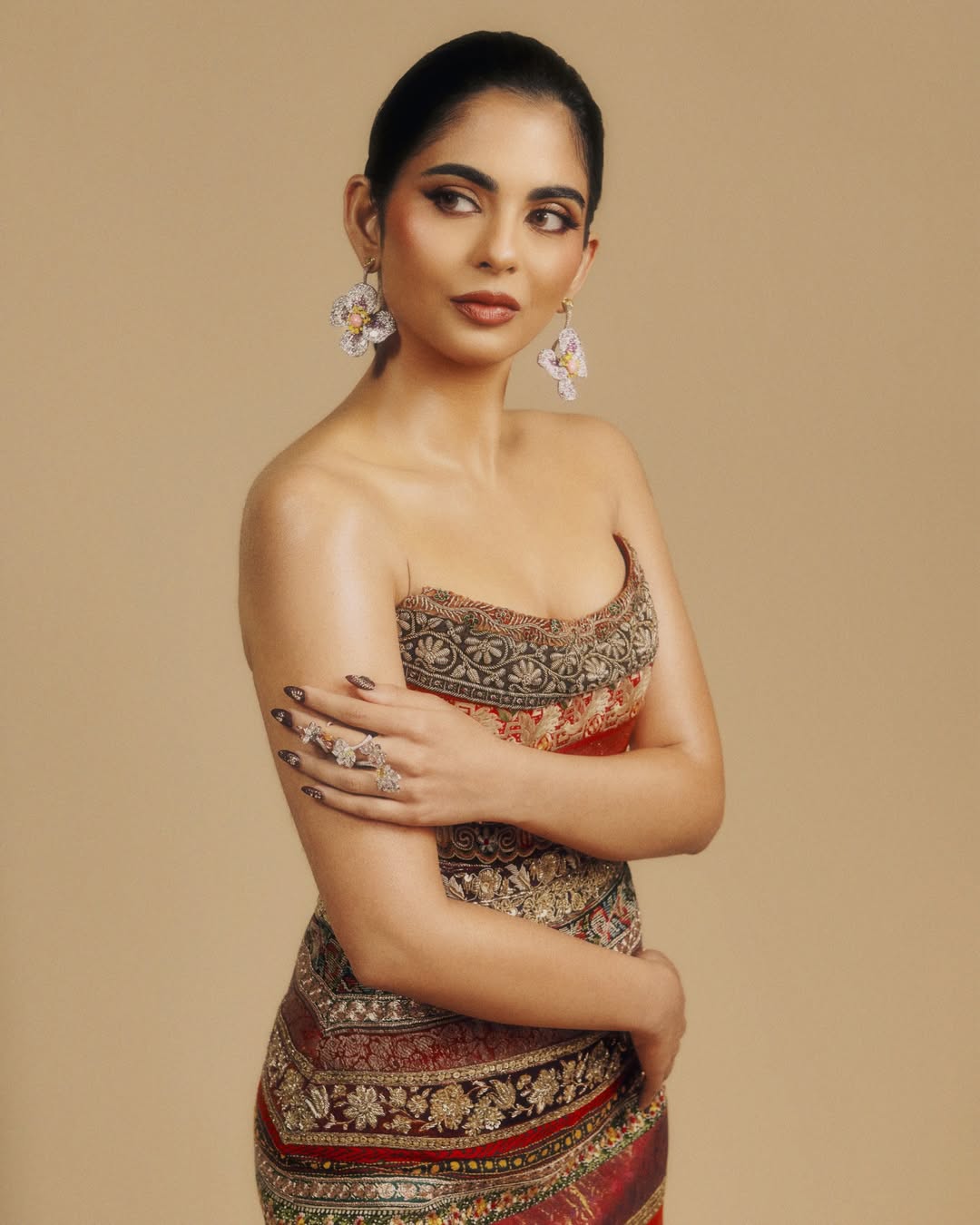 Isha Ambani in custom 26 regional borders dress