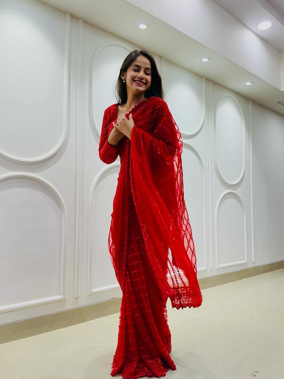 Prapti Redkar in red designer saree