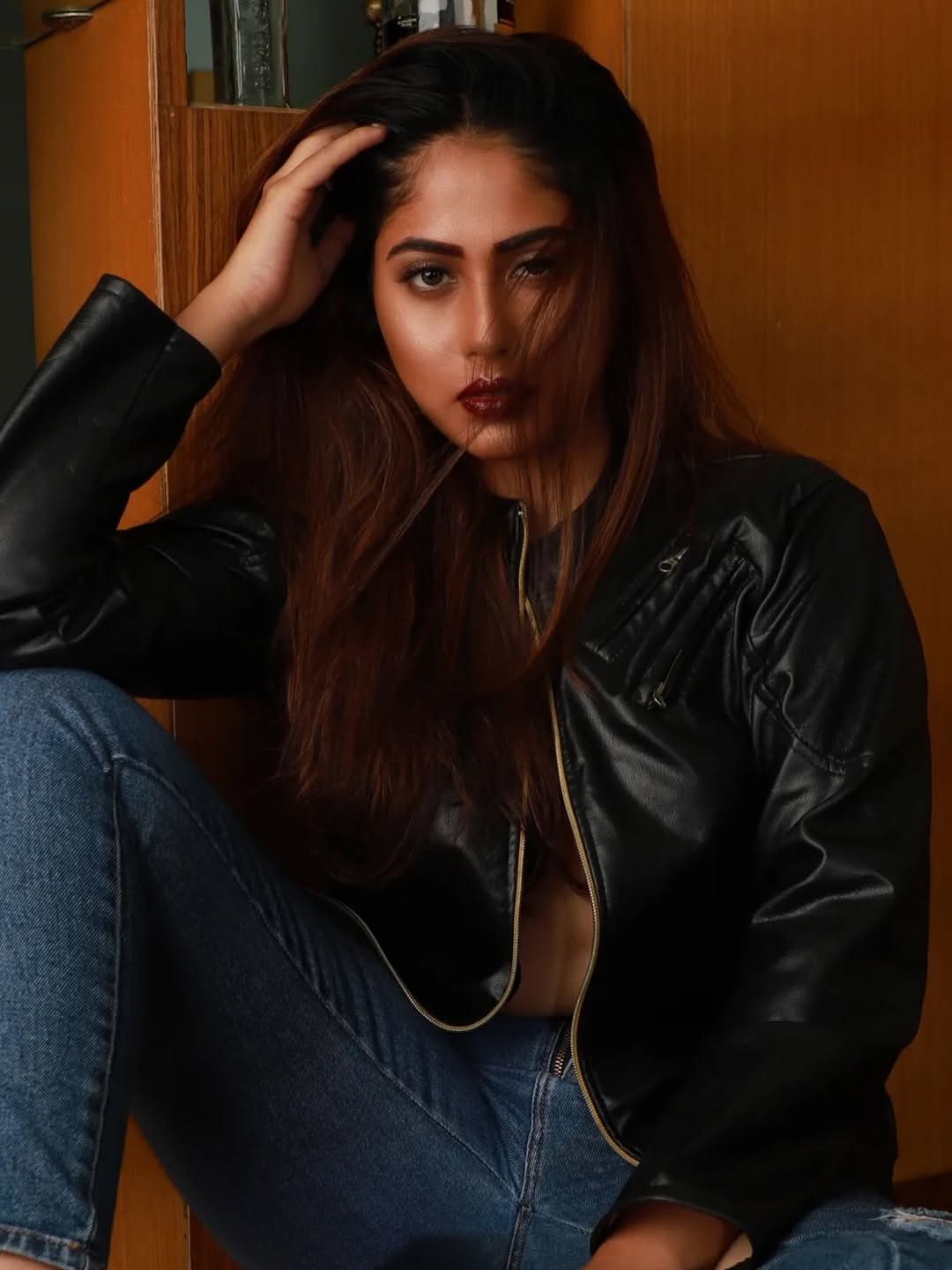 Akshaya Hindalkar black leather jacket.