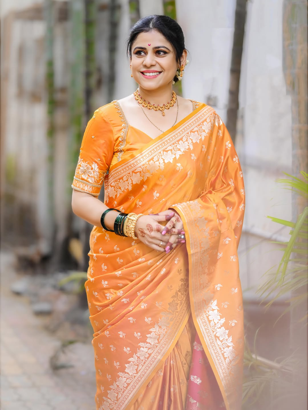 Ashvini Mahangade Orange Saree Look