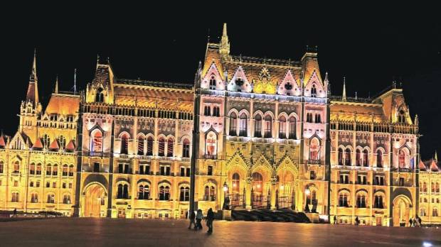 Budapest Parliament building night view along Danube river | Hungary new Prime Minister Peter Magyar victory analysis | Viktor Orban political defeat in Hungary elections | Eastern Europe travelogue and political analysis Marathi news