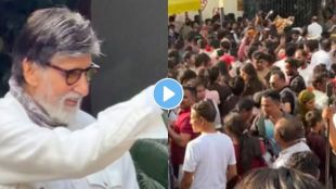 Bollywood superstar Amitabh Bachchan waving to fans outside Jalsa while a fan fainted in the crowd