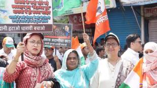 Dharavi redevelopment project protest Mumbai | Adani Group Dharavi project controversy | Varsha Gaikwad Dharavi protest news | 500 square feet house demand Dharavi residents