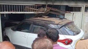 sangli miraj accident electric car crashes into house | mahatma gandhi chowk miraj market traffic collision | sangli city police station accident case registration | ev car control failure maharashtra road safety accident