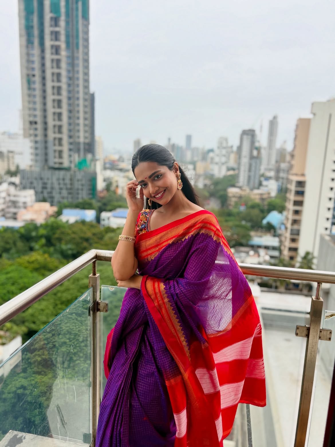Marathi actress Vallari Viraj in black printed dress.