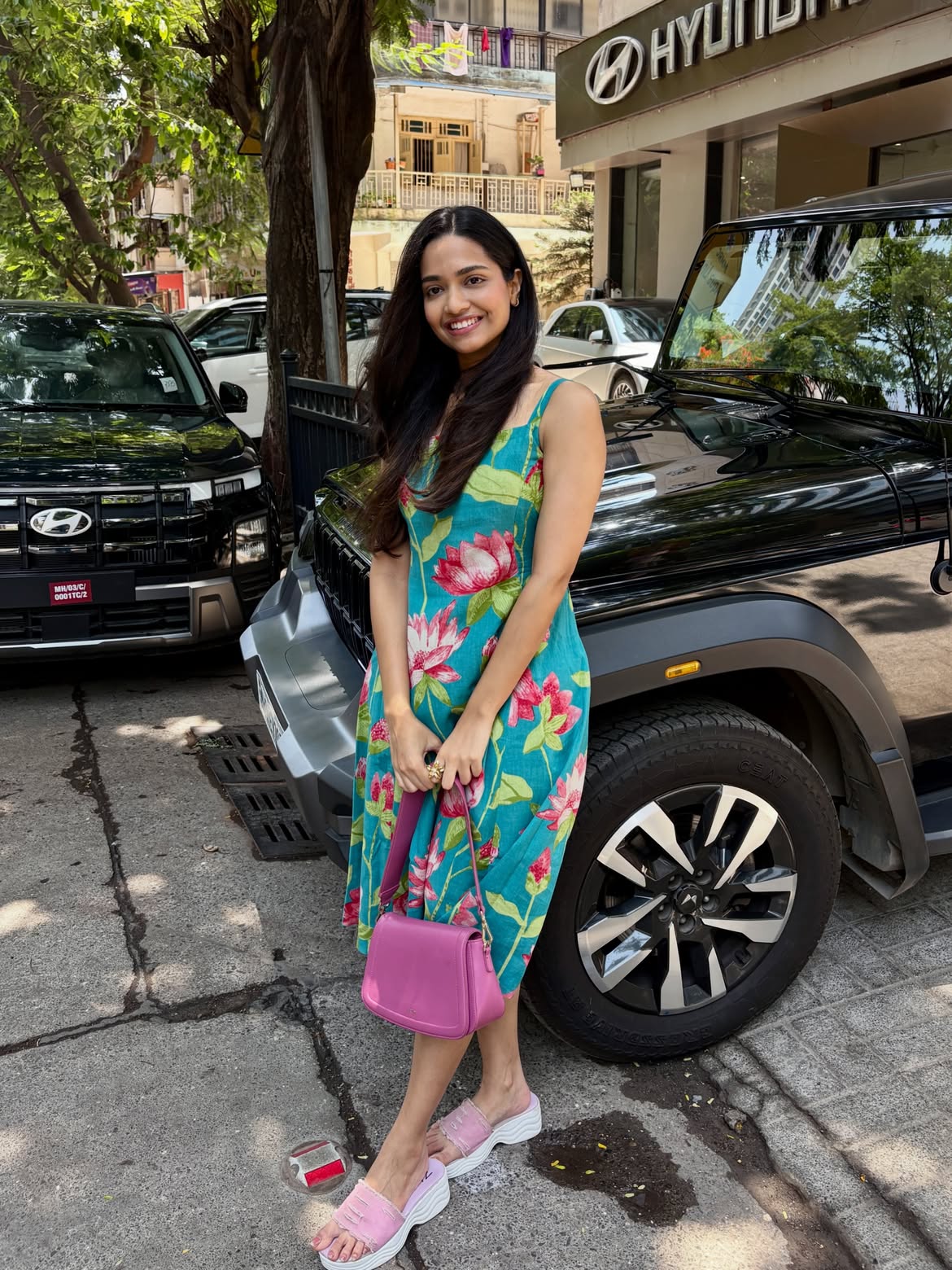 Marathi actress Vallari Viraj in black printed dress.