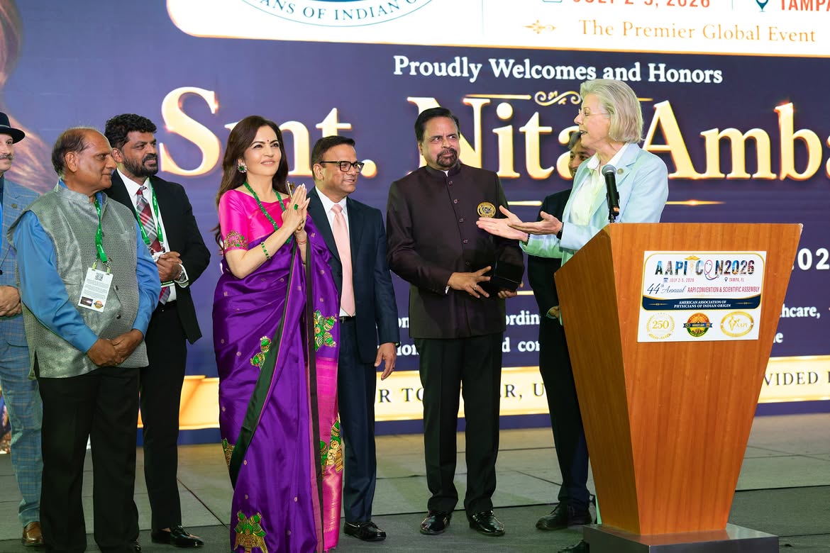 Nita Ambani purple Kanjeevaram saree photos