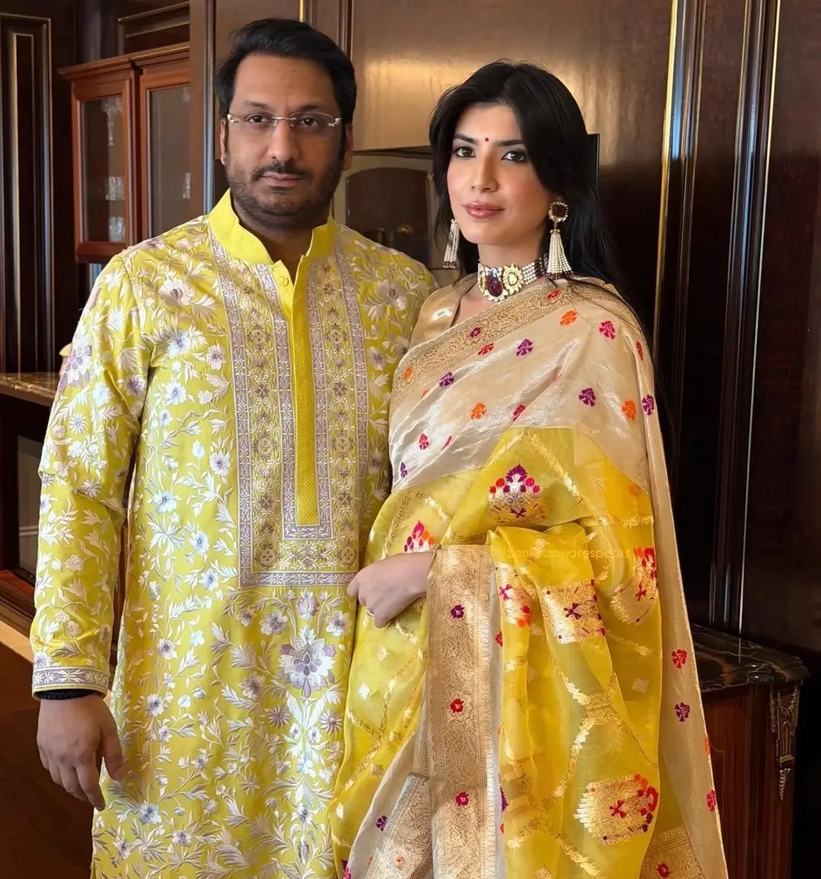 Kayinaat Dara engagement yellow saree look photos