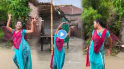 ‘चक धुम धुम’ गाण्यावर भरपावसात तरुणी झाली बेभान; VIDEO होतोय तुफान व्हायरल