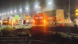 Mumbai Pune Expressway truck accident today Khopoli | Truck falls into valley Dheku village Khalapur rescue operation | Driver rescued from 40 feet deep valley Expressway | Highway Police Borghat Devdoot rescue team accident photo