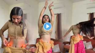Woman Dances With a Lit Oil Lamp