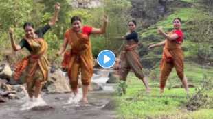 Two Young Girls dance together