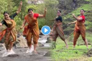 Two Young Girls dance together