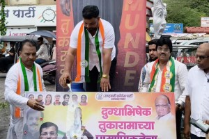 Tukaram Mundhe cutout milk pouring Badlapur | NCP Sharad Pawar faction Tukaram Mundhe honoring | FDA Commissioner Tukaram Mundhe action news | Badlapur news updates