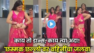 Woman in pink Banarasi saree performing Chammak Challo dance in a viral social media video