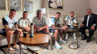 Argentina Board president post ritual photo with messi and de paul before semi final