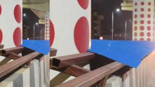 mira-bhayandar metro bridge safety | mmrda notice to municipal corporation | dangerous metal sheets on bridge | road accident risk in mira bhayandar