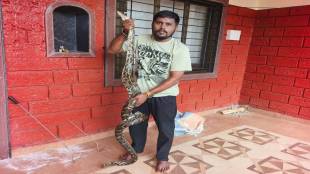 12 feet python rescue in Guhagar | Ratnagiri snake rescue news | giant python found in bathroom | professional snake catcher Jay Kajrolkar