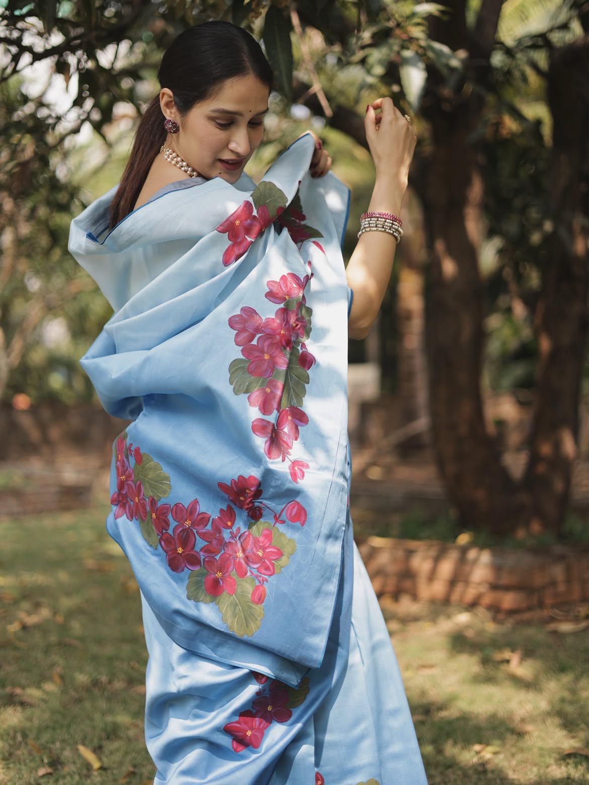 Sagarika Ghatge floral saree look