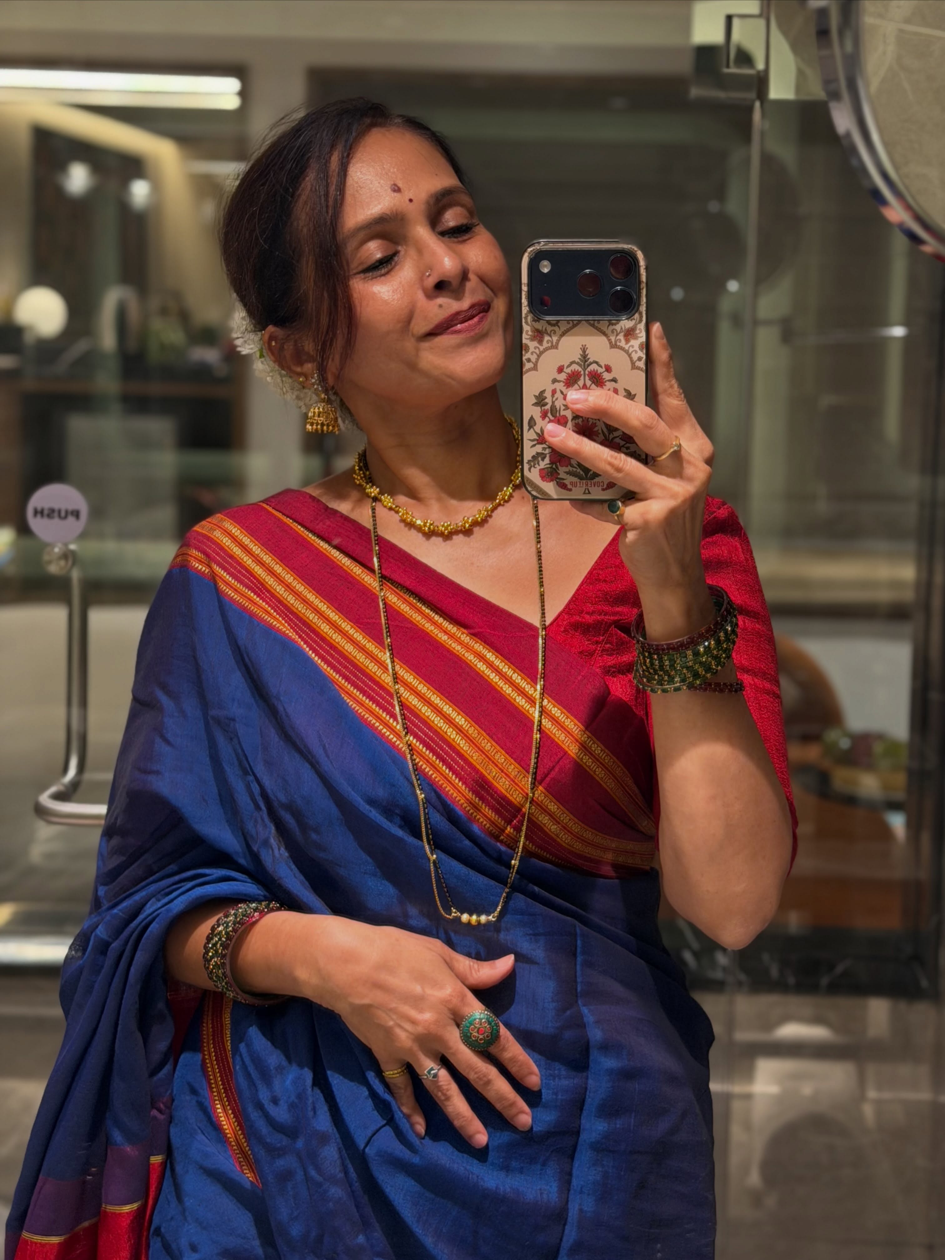 Aishwarya Narkar Orange Saree Look