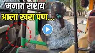 auto driver rides beside woman on scooter