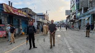 Police securing the area after the suicide blast at the Swat Peace Rally in Pakistan