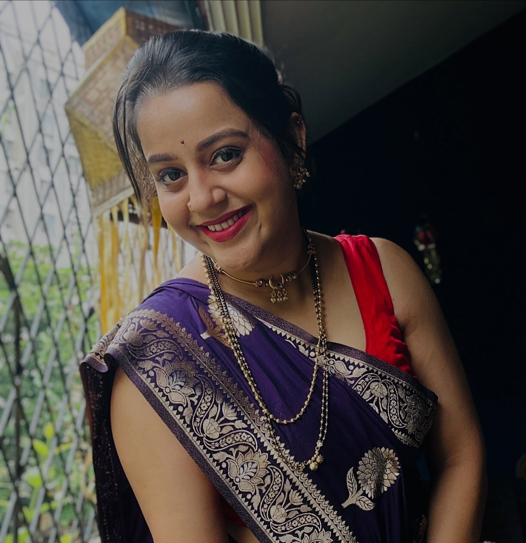 Amrutaa Bane Purple Saree Look